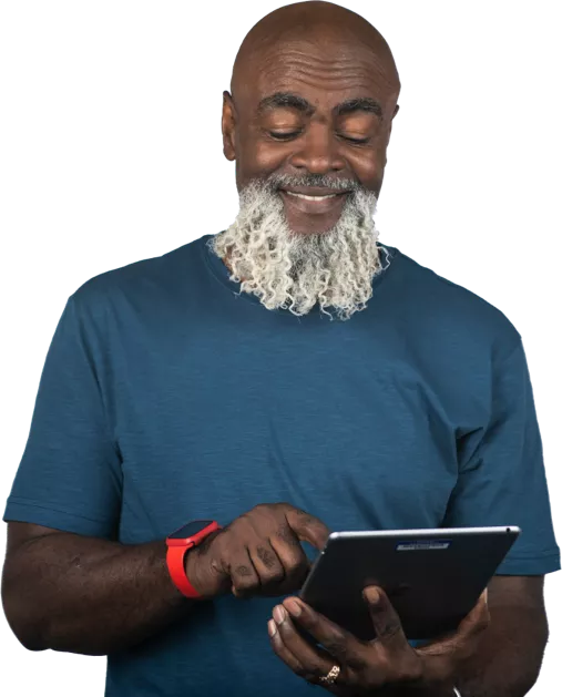 middle aged man smiling looking at phone